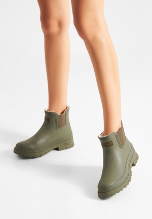 Woden Bottes en caoutchouc - dark olive
