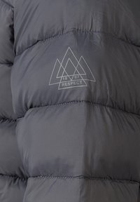 Gray padded jacket featuring a geometric logo with "RESPECT" and "1997" text. Smooth texture with stitched detailing and a puffy design.