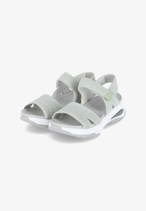 Light gray athletic sandals with mesh straps and adjustable closures, featuring a white midsole and textured rubber outsole for grip.