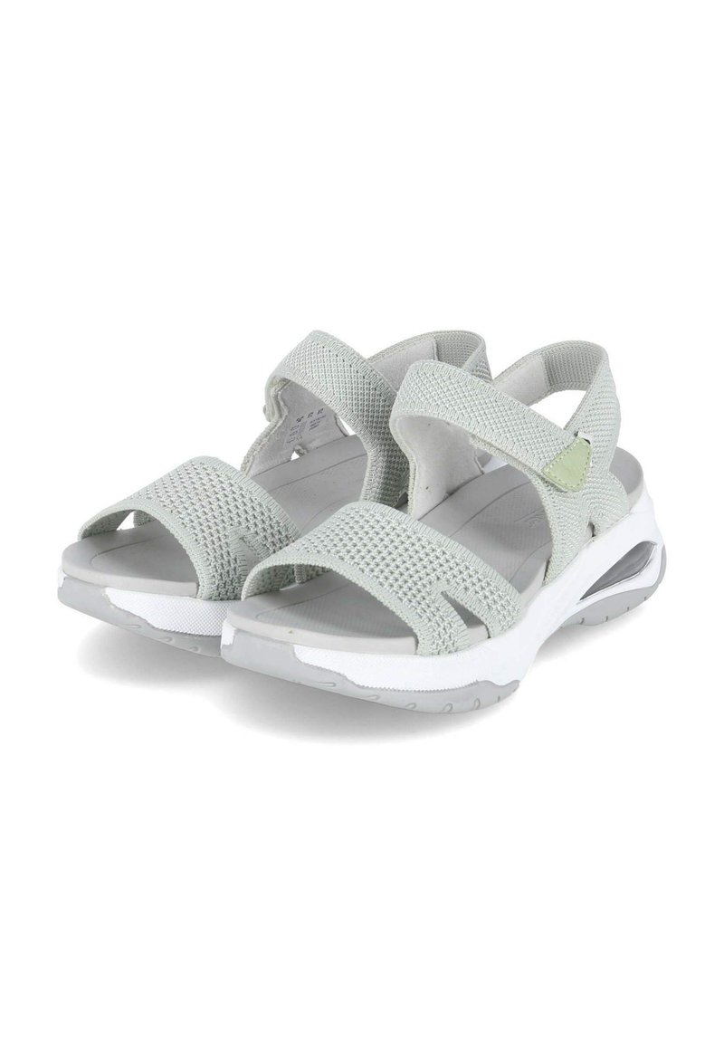 Sandales de sport gris clair avec des brides en mesh et des fermetures ajustables, dotées d'une semelle intermédiaire blanche et d'une semelle extérieure en caoutchouc texturé pour l'adhérence.