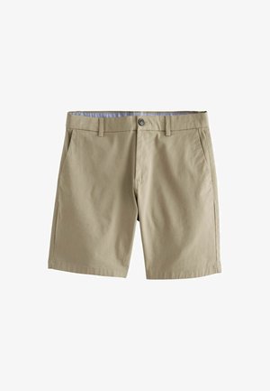 Šviesiai rudos šortai, pagaminti iš minkštos medžiagos, su priekinėmis kišenėmis, mygtuko uždarymu ir šviesesne juosmens juosta. Lygus paviršius, pritaikytas dizainas.