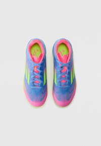Colorful athletic shoes with a blue upper, pink accents, and neon green details. Features a textured surface and traditional lacing.