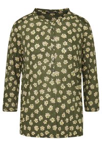 Vihreä pitkähihainen paita pyöreällä pääntiellä, jossa on etupainike ja valkoisten ja keltaisten kukkien kukkakuosi.