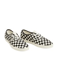 Black and white checkerboard canvas sneakers with white laces and rubber soles. Low-top design with smooth texture and reinforced stitching.
