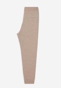 Beige, taillierte Hose aus weichem, strukturiertem Stoff. Mit einem gerippten Bund und einer einzigen Gesäßtasche. Schlanker Silhouette.