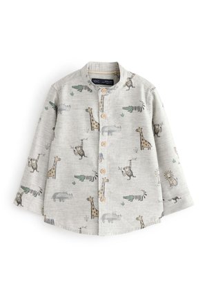 Chemise enfant à manches longues gris clair avec boutons en bois, ornée d'imprimés ludiques de singes, girafes, crocodiles, rhinocéros et lions.