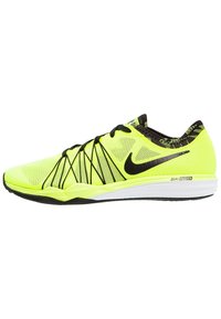 Neonově žlutá běžecká bota Nike s černými tkaničkami, černým logem swoosh a bílou podešví označenou Dual Fusion, boční pohled na bílém pozadí.