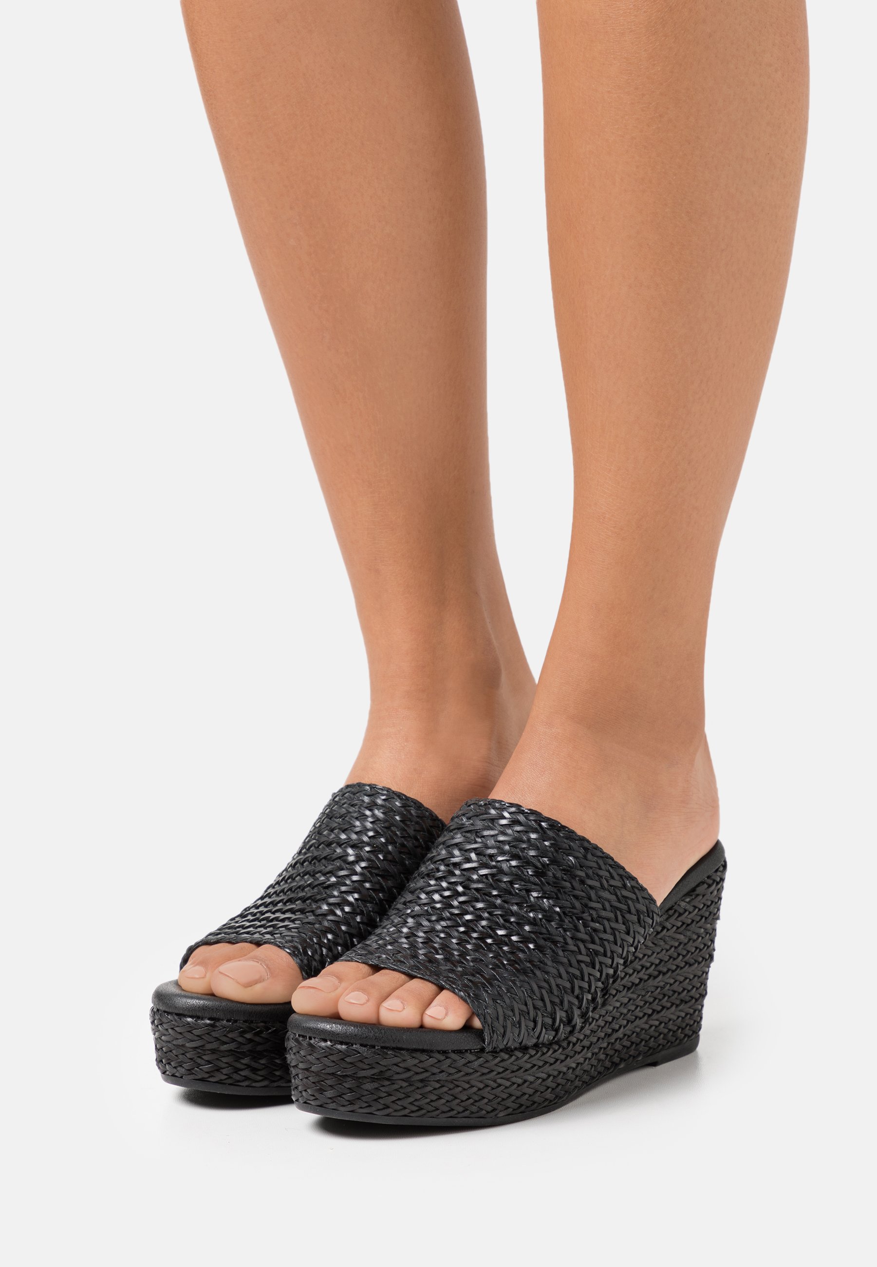 mules xti