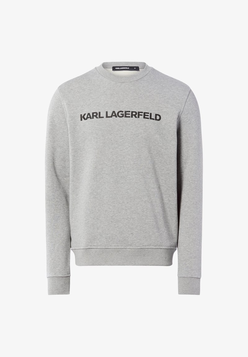 Sudadera gris hecha de un tejido suave, con escote redondo, mangas largas y el texto "KARL LAGERFELD" en negrita negra en la parte frontal.