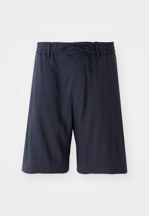 Pantalones cortos azul marino con cintura elástica, cordón ajustable y un tejido suave y texturizado. Presenta un corte a la altura de la rodilla y un diseño minimalista.