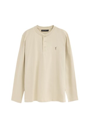 Beiges Langarm-Henley-Shirt mit drei Knöpfen, Rundhalsausschnitt und kleinem gesticktem Polo-Spieler-Logo auf der linken Brust.