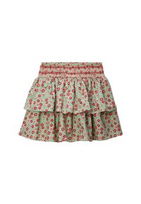 Jupe à imprimé floral avec une taille smockée, des volants superposés, sur un fond vert avec des fleurs rouges et des feuilles vertes.