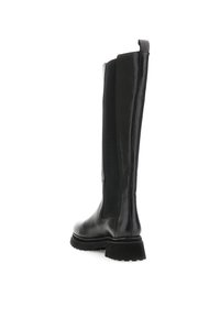 Bota de cuero negro hasta la rodilla con paneles elásticos, punta redonda, suela gruesa y un acabado texturizado. El tacón es ligeramente elevado.