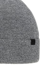 Knitted gray beanie hat with a ribbed texture, featuring a folded cuff and a small black logo tag on the side.
