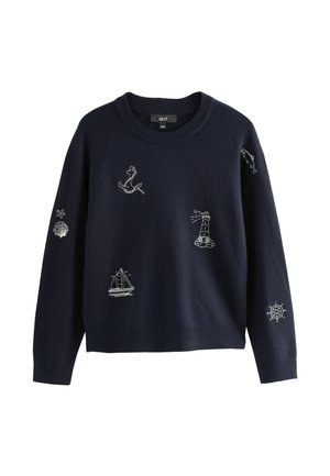 Mörkblå tröja med vitt nautiskt broderi: ankare, fyr, båt, sjöstjärna och kompass. Ribbad mudd och nederkant.