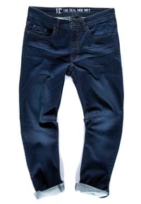 Jeans de mezclilla oscura con corte recto, que cuentan con dos bolsillos frontales, un bolsillo para monedas y dobladillos enrollados que revelan un forro azul más claro.