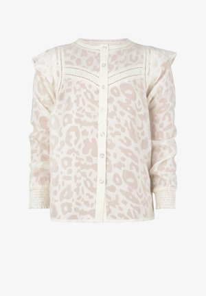 Blusa leggera in crema con un delicato motivo leopardato, bottoni sul davanti, maniche a volant e polsini arricciati per un tocco di texture.
