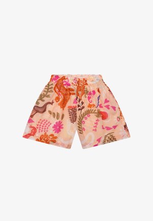 Kinderbroekjes met elastische taille en kleurrijke abstracte bloemen- en dierenpatronen in roze, oranje en groene tinten op een perzikachtige achtergrond.