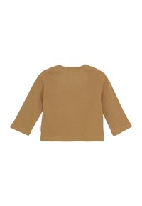 Langarm geribbelde top in een mosterdkleur. Kenmerkt zich door een ronde halslijn en een zachte textuur. Eenvoudig ontwerp zonder extra patronen of hardware.