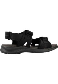 Sandalias negras con correas ajustables, suela acolchada, diseño abierto y plantilla texturizada para mayor comodidad. Adecuadas para un uso casual.