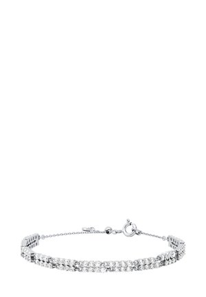 Silver-tone bracelet featuring interlinked rows of clear crystals, a lobster clasp, and a rectangular accent with branding.