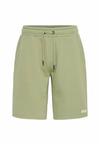 Lysgrønne bomuldsshorts med elastisk talje, snøre og sidelommer; glat tekstur, knælængde design, minimal branding.