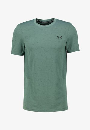 Groen sport T-shirt gemaakt van vochtregulerende stof. Met een ronde hals, korte mouwen en een subtiel textuurpatroon. Zwarte logoaccent.