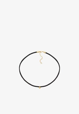 Collier en corde noire avec un petit pendentif en perle d'or et un fermoir en or avec une chaîne réglable sur un fond blanc.