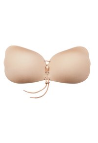 Nude strapless-bra ilman saumoja, joka sisältää etupuolelle sidottavan yksityiskohdan ja pehmeät tekstuurit mukavuutta varten.