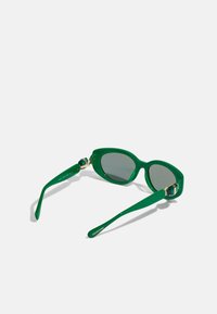 Swarovski Saulesbrilles - green