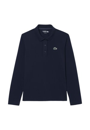 Polo de manga larga en color navy, hecho de algodón, con una tapeta de tres botones, que presenta un logo de cocodrilo bordado en verde en el lado izquierdo del pecho.
