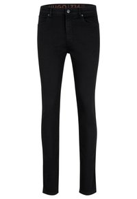 Black denim jeans with a slim fit, featuring a zip fly, five pockets, and a slight stretch for comfort. Stitched detailing on seams.