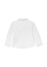 Biała koszula z długim rękawem i kołnierzykiem, z mankietem na guziki i gładkim tyłem. Miękki materiał o gładkiej fakturze.
