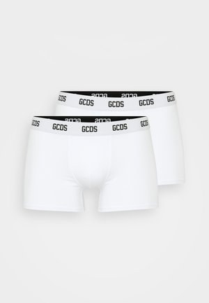 Boxers blancs avec une ceinture noire sur laquelle sont imprimés en blanc "GCDS" et "2023". Texture lisse, design ajusté, ensemble de deux.