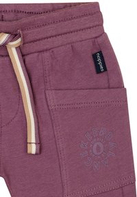 Lila Sweatpants mit einem Kordelzugbund, ausgestattet mit einem strukturierten Logo-Detail und seitlichen Taschen. Weicher Baumwollmischstoff.