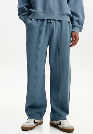 SKATER - Tracksuit bottoms - dark blue