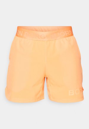 Bermudas atléticas laranja com um cós texturizado. Apresentam um discreto logótipo reflexivo "BORG" na perna esquerda. Tecido suave, corte descontraído.