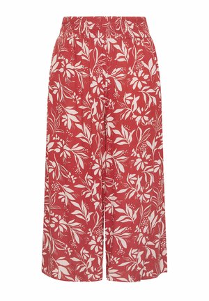 Røde bukser med vidde i benene og elastisk talje, med et hvidt blomstermønster og blade over det hele.