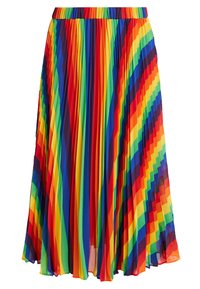 Jupe plissée avec des rayures diagonales audacieuses en rouge, orange, jaune, vert, bleu et violet. Fabriquée en tissu léger et fluide.
