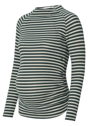 Těhotenský top s dlouhým rukávem se zelenými a bílými vodorovnými pruhy a shrnutými stranami pro pohodlí bříška.