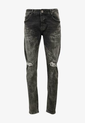 Lieknos, nublankintos juodos džinsinės kelnes su nusidėvėjusiais kelių įdėklais. Su standartinėmis kišenėmis ir mygtukų užsegimu.