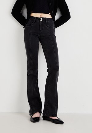 Flared Jeans - black denim