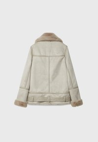 Beige faux shearling jacket with a soft collar, long sleeves, and detailed stitching on the back. Features a cinched waist design.