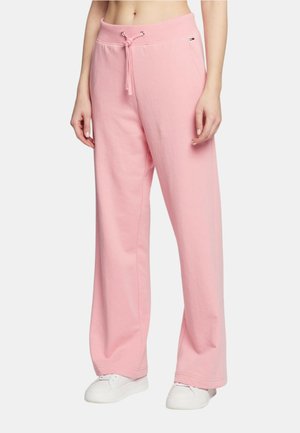 Pantaloni a gamba larga rosa realizzati in morbido cotone, con vita elastica e cordoncino, e una piccola etichetta logo sul lato.