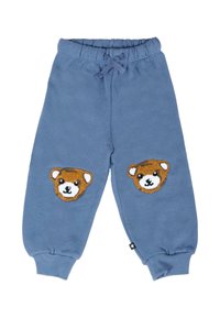 Blauwe sweatpants gemaakt van zacht materiaal, met aan beide knieën twee applicaties van een berengezicht en een trekkoord in de taille voor een verstelbare pasvorm.