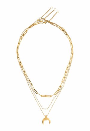 Three-layer gold chain necklace with rectangular links, small white beads, and crescent-shaped pendant on the longest layer.