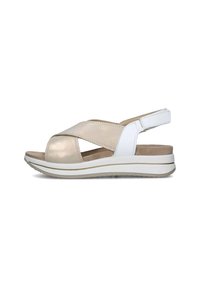Sandali slingback beige e bianchi con design a fascia incrociata, soletta imbottita e suola piatta leggera con finitura testurizzata.