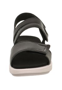 Schwarze Sandalen mit zwei verstellbaren Riemen, flachem Profil und weicher Innenauskleidung. Verfügen über eine strukturierte Oberfläche und weiße Außensohle.