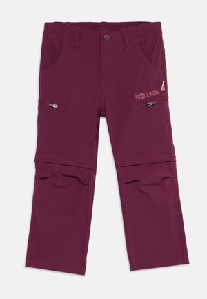 Kinder dunkellila Outdoorhose mit zip-off Beinen, Reißverschlusstaschen am Oberschenkel und elastischem Bund.