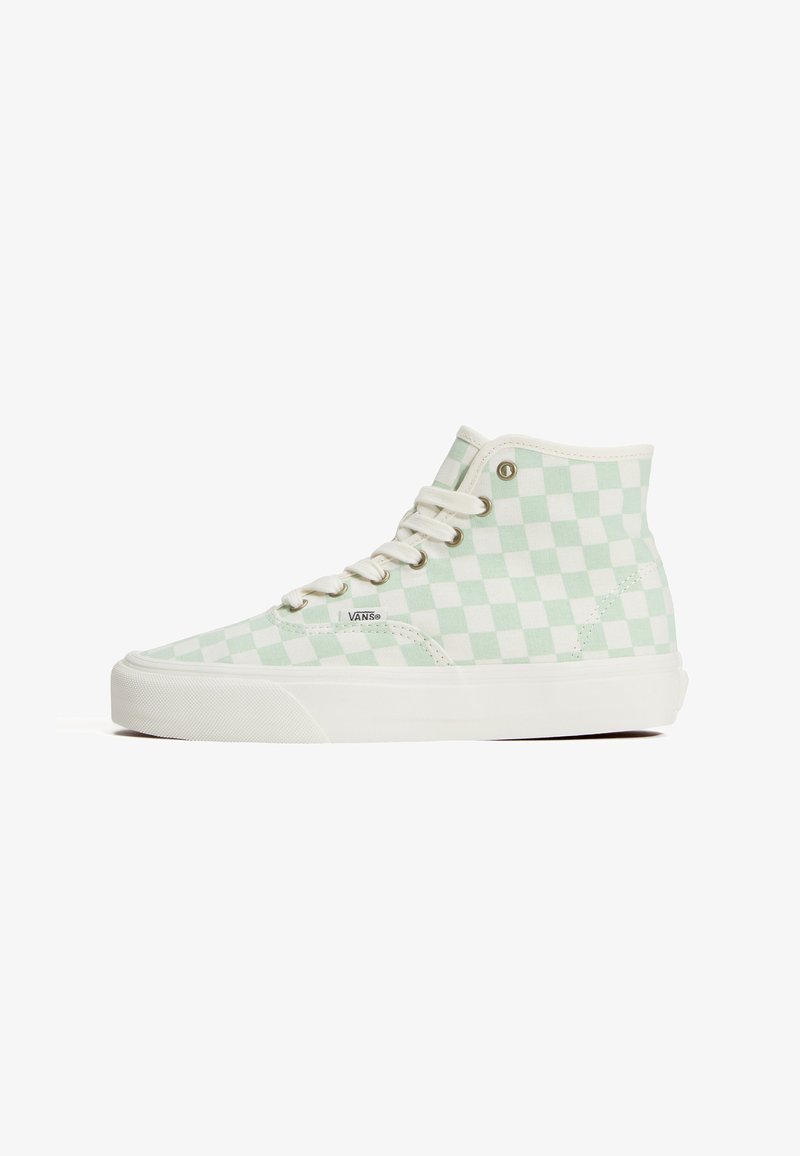 Υψηλά αθλητικά Vans με ανοιχτοπράσινο και λευκό σχέδιο σκακιέρας, λευκή λαστιχένια σόλα και λευκά κορδόνια.